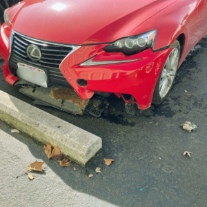 Front bumper of car torn off