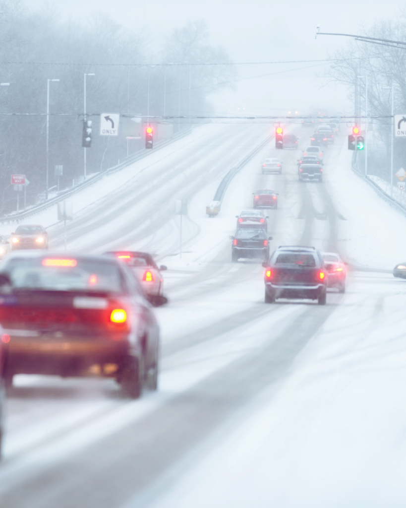 Cars on a snow city road